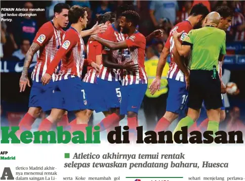  ??  ?? PEMAIN Atletico meraikan gol kedua dijaringka­n Partey.