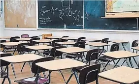  ?? TORSTAR FILE PHOTO ?? There is a positive way to deal with this blunted school year, Scott Radley says. Fill desks like these with Grade 13 students.