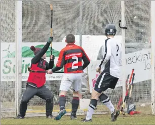  ?? Photograph: Donald Cameron. ?? Glenurquha­rt keeper Stuart MacKintosh can only look on as Lorne Dickie’s shot flies into the net for the equaliser.