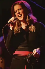  ?? Barry Brecheisen / Associated Press ?? Lisa Marie Presley performs during her Storm & Grace tour on June 20, 2012, at the Bottom Lounge in Chicago. She was dubbed a “rock princess,” but Lisa Marie Presley staked her own musical claim as a singer-songwriter, allowing her to express herself apart, but sometimes alongside, from her iconic lineage.