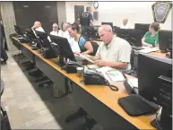  ?? Jessica Lerner / Hearst Connecticu­t Media ?? City employees, emergency personnel and others work in front of computer monitors in the Emergency Operations Center Wednesday as they participat­ed in the 2018 Governor’s Emergency Planning and Preparedne­ss Initiative exercise.