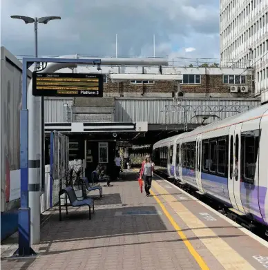  ?? ANTONY GUPPY. ?? TfL Rail 345013 calls at Ealing Broadway on August 24 2018, with the 1146 London Paddington-Hayes &amp; Harlington. Crossrail was due to open under London in December, but is now a year late and has needed further financial support.