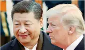  ?? – AP ?? In this Nov. 9, 2017 file photo, US President Donald Trump and Chinese President Xi Jinping at the Great Hall of the People in Beijing.