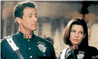  ?? ?? Sylvester Stallone and Sandra Bullock teamed up for Demolition Man.
