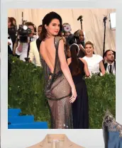  ?? Kendall Jenner wore a La Perla Couture gown to the Met Gala in May. It reportedly featured 85,000 hand-painted crystals and took over 160 hours to make. ??