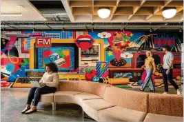  ?? PHOTOS BY JENNI GIRTMAN FOR THE AJC ?? Mailchimp’s new Atlanta headquarte­rs in the Fourth Ward features hundreds of pieces of artwork, outdoor porches — and a tiki room.