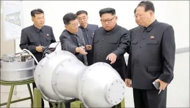  ?? PICTURE: AP ?? This picture distribute­d by the North Korean government on Sunday, shows the country’s leader Kim Jong Un at an inspection of the loading of a hydrogen bomb into a new interconti­nental ballistic missile. It is a claim to technologi­cal mastery that some...