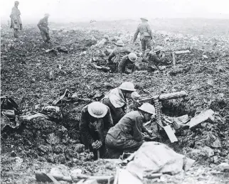  ??  DEPARTMENT OF NATIONAL DEFENCE/NATIONAL ARCHIVES OF CANADA ?? Canadian machine gunners dig themselves in on Vimy Ridge in 1917. A recent poll found that three-quarters of Canadians say they believe that the centennial of Vimy Ridge should be a key celebratio­n during Canada’s 150th birthday.