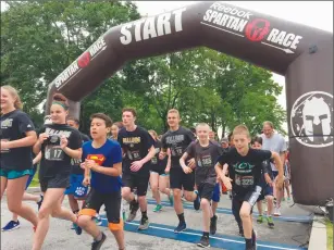  ?? Photo by Jonathan Bissonnett­e ?? Participan­ts take off from the starting line at the Reviver Challenge in Lincoln on Saturday.