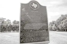  ?? Elizabeth Conley / Houston Chronicle ?? The Camp Logan Historical Marker that was rededicate­d Wednesday at Memorial Park was defaced with paint within 24 hours of the ceremonies.