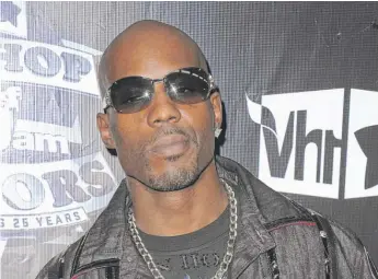  ?? PETER KRAMER/AP ?? DMX (shown in 2009) remained in a coma on Sunday, a statement said.