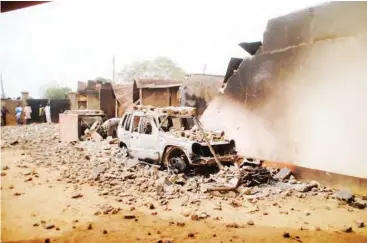  ?? Shehu K. Goro ?? Houses destroyed during the fracas PHOTOS: