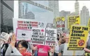  ?? AP FILE ?? Protesters rally against the repeal of the Obamacare healthcare law in front of Trump Tower in Chicago.