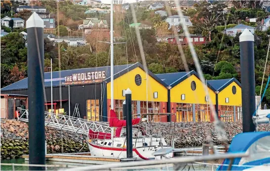  ??  ?? The Woolstore, overlookin­g Te Ana Marina, will benefit from a planned walkway to Lyttelton.