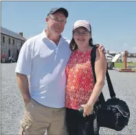  ?? LAURA JEAN GRANT/CAPE BRETON POST ?? Mike and Gail Harrington, from Orilia. Ont., were among many who visited the Fortress of Louisbourg during its annual Culture Fête celebratio­ns.