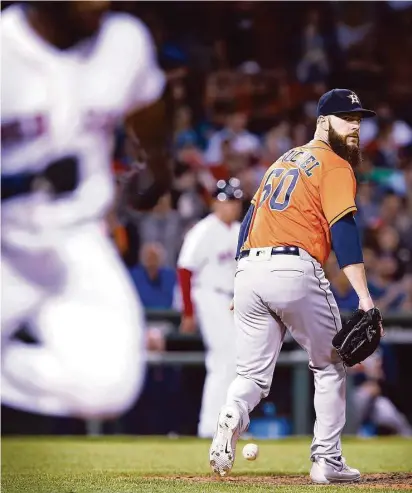  ?? Adam Glanzman / Getty Images ?? What else can go wrong for Dallas Keuchel? Winless in his last five starts, he couldn’t retire Boston’s Jackie Bradley Jr. on a soft sixth-inning grounder to the mound Thursday night. Bradley was 2-for-4, extending his hitting streak to 18 games.