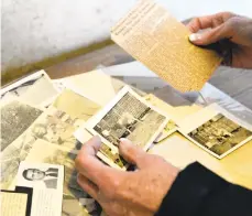  ?? MONICACABR­ERA/THE MORNING CALL ?? A long-lost 4-H scrapbook of Phillipsbu­rg area farmer Ernie Vargo was returned to his family after passing through the hands of several strangers.