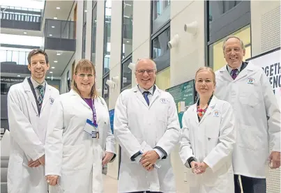  ??  ?? From left: John Alexander, Karen Marjoram, Professor Mike Ferguson and Dr Morag Martin from Dundee University’s School of Life Sciences, and Angus Macmillan Douglas.