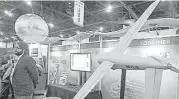  ?? James Nielsen / Houston Chronicle ?? The Tiburon Unmanned Aerial System was featured at the Intuitive Machines booth.