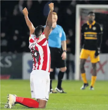  ??  ?? Tyrone Barnett celebrates the win over Newport