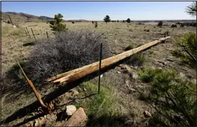  ?? MATTHEW JONAS — DAILY CAMERA ?? Broken utility poles are seen Monday along U.S. 36between Lefthand Canyon Drive and Nelson Road in Boulder County after high winds were reported over the weekend.