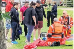  ??  ?? RESCUE Paramedics prepare lad for air ambulance flight to hospital in Leeds