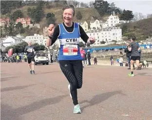  ??  ?? ● Diane Holmes of Cybi Striders won her FV60 age category at the rearranged Nick Beer 10K race in Llandudno on Saturday