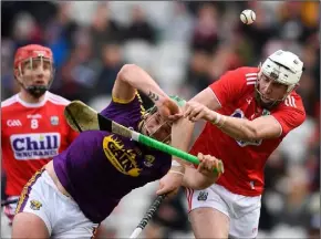  ??  ?? Conor McDonald in a clash with Cork defender Tim O’Mahony.