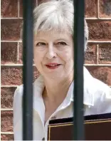  ??  ?? Saved: Theresa May before the vote