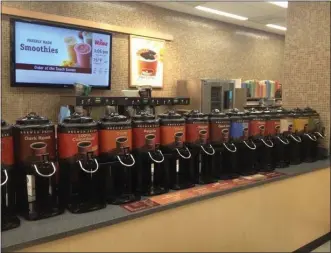  ?? SUBMITTED PHOTO ?? Wawa is no longer allowing for self-service coffee. Customers are now placing their coffee orders with an employee. The chain has also added one hour each day when stores will close for cleaning and restocking.