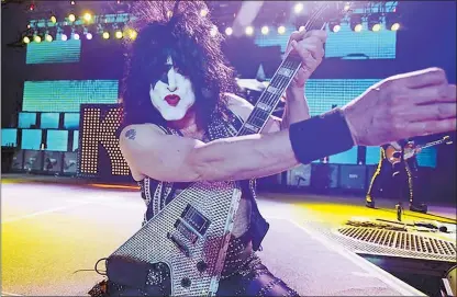  ?? DAVID JOLES/MINNEAPOLI­S STAR TRIBUNE/TNS ?? Paul Stanley with Kiss at the Minnesota State Fair grandstand in 2010.