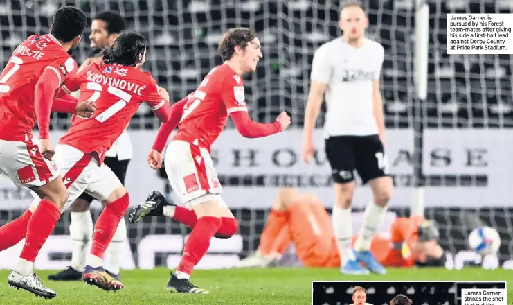  ??  ?? pursued by his Forest team-mates after giving his side a first-half lead against Derby County at Pride Park Stadium.