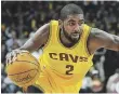  ?? KEN BLAZE, USA TODAY SPORTS ?? Kyrie Irving hurt his back against the Hornets on Friday.