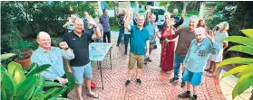  ?? ?? Vincent Street residents gathered on Wednesday night to sign a petition against speed humps in their street.