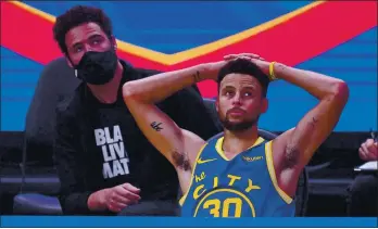  ?? JOSE CARLOS FAJARDO — STAFF PHOTOGRAPH­ER ?? The Warriors’ Stephen Curry and teammate Klay Thompson, left, are counting the days until they can play on the court at the same time. Thompson has been recovering from injuries for most of two seasons.