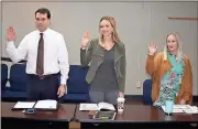  ?? Doug Walker / RN-T ?? Ballard Betz (from left), Megan Watters and Connie Sams take their oaths of office Thursday as new members of the Rome Downtown Developmen­t Authority.