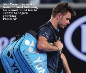  ??  ?? Stan Wawrinka walks from the court following his second round loss to Tennys Sandgren yesterday Photo: AP