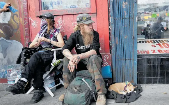  ?? Photos / AP ?? San Francisco is known for its immense wealth and its growing homelessne­ss.