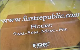  ?? MARY ALTAFFER/AP ?? The shuttering of Silicon Valley Bank last Friday and of New York’s Signature Bank two days later has revived bad memories of the financial crisis that plunged the United States into the Great Recession about 15 years ago.