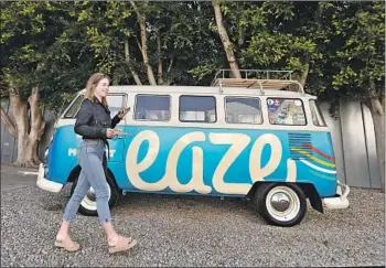  ?? Photograph­s by Al Seib Los Angeles Times ?? ACACIA FRIEDMAN takes a break from the “Dawn of Legal Cannabis” event at Eaze’s new L.A. headquarte­rs in Venice. The company connects consumers to dispensari­es for home pot deliveries.