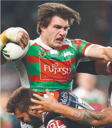  ?? Picture: GETTY IMAGES ?? HOPPING OFF: The Rabbitohs’ Angus Crichton is tackled by Roosters players, who will become his teammates in 2019.