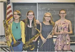  ?? BY HOLLY JENKINS ?? Left to right, RCHS's Jackson Norris, Skye Kirchman, Sophia Hernandez and Ninon Kirchman earn coveted chairs in various performing ensembles