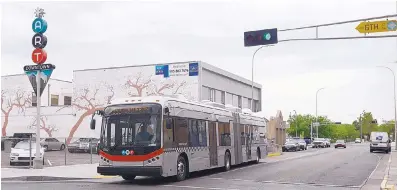  ?? ADOLPHE PIERRE-LOUIS/JOURNAL ?? An ART bus pulls out of the Downtown Station at Gold and 6th Street SW last week.