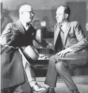  ?? HERALD FILE PHOTO ?? CRIME DOES PAY: Oliver B. Garrett, right, confers with attorney Herbert F. Callahan.