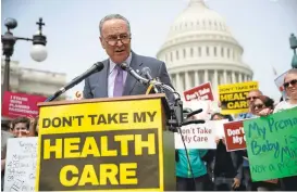  ?? ALEXWONG/GETTY IMAGES ?? U.S. Senate Minority Leader Sen. Charles Schumer, D-NY, speaks during a Stop “Trumpcare” rally Thursday in front of the Capitol inWashingt­on, D.C.