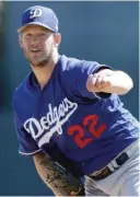  ?? CARLOS OSORIO/AP ?? Dodgers starting pitcher Clayton Kershaw has been battling shoulder inflammati­on this spring.