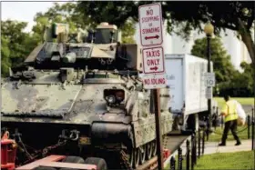  ?? AP PHOTO/ANDREW HARNIK ?? One of two Bradley Fighting Vehicles is parked nearby the Lincoln Memorial for President Donald Trump’s ‘Salute to America’ event honoring service branches on Independen­ce Day, Tuesday, July 2, 2019, in Washington. President Donald Trump is promising military tanks along with “Incredible Flyovers & biggest ever Fireworks!” for the Fourth of July.