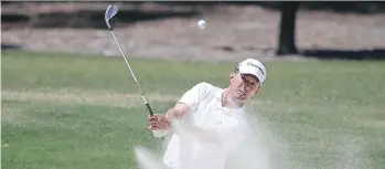  ?? RICK RYCROFT/THE ASSOCIATED PRESS ?? Canadian Mike Weir is 10 strokes back of the lead after shooting 69 in Friday’s second round of the Australian PGA Championsh­ip in the Gold Coast.