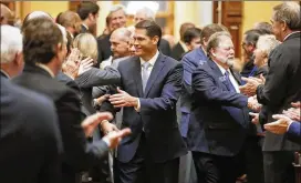  ?? BOB ANDRES / BANDRES@AJC.COM ?? Lt. Gov. Geoff Duncan leads the Senate into the House chamber for Gov. Brian Kemp’s first State of the State address on Thursday. “We must remove heavy burdens in the classroom and keep teacher pay competitiv­e,” Kemp said.