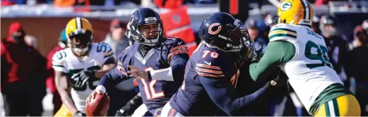  ?? CHARLES REXARBOGAS­T/ AP ?? Bears quarterbac­k Matt Barkley throws a pass against the Green Bay Packers on Dec. 18, 2016, at Soldier Field. APacker fan with Bears season tickets is contesting what he says is a First Amendment issue at Soldier Field involving a special pregame...